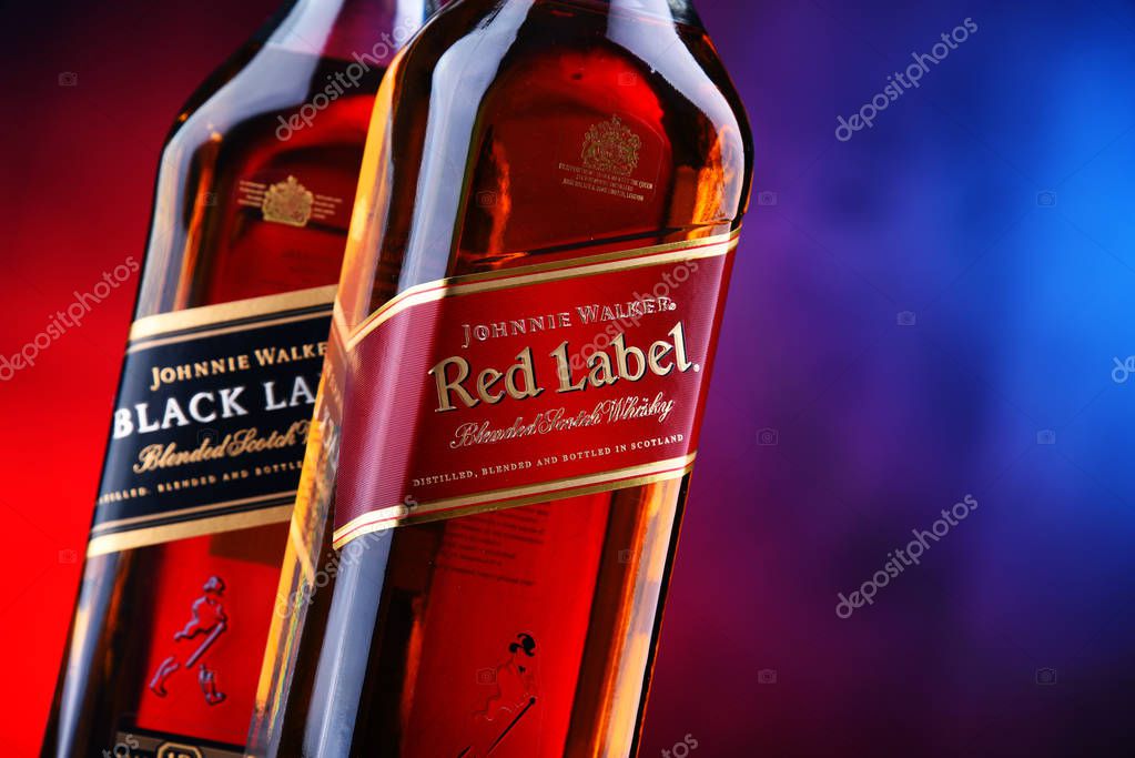 POZNAN, POL - NOV 15, 2018: Bottles of Johnnie Walker, the most widely distributed brand of blended Scotch whisky in the world with sales of over 130 million bottles a year.