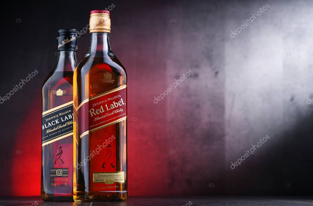 POZNAN, POL - NOV 15, 2018: Bottles of Johnnie Walker, the most widely distributed brand of blended Scotch whisky in the world with sales of over 130 million bottles a year.
