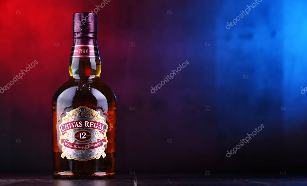 POZNAN, POL - NOV 29, 2018: Bottle of Chivas Regal 12, a blended Scotch whisky made from whiskies matured for at least 12 years, produced by Chivas Brothers in Keith, Scotland