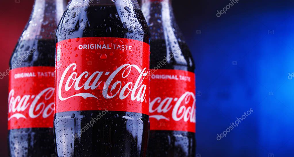 POZNAN, POLAND - NOV 29, 2018: Plastic bottles of Coca-Cola, a carbonated soft drink manufactured by The Coca-Cola Company headquartered in Atlanta, Georgia, USA