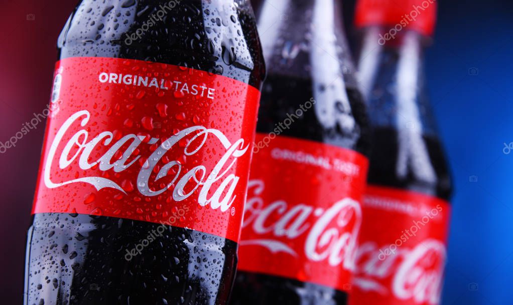 POZNAN, POLAND - NOV 29, 2018: Plastic bottles of Coca-Cola, a carbonated soft drink manufactured by The Coca-Cola Company headquartered in Atlanta, Georgia, USA