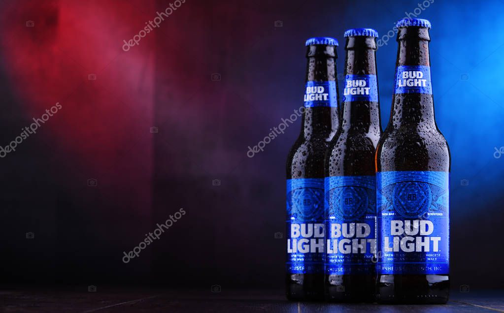 POZNAN, POL - NOV 29, 2018: Bottles of Bud Light beer, an American light beer, produced by Anheuser-Busch, introduced in 1982.