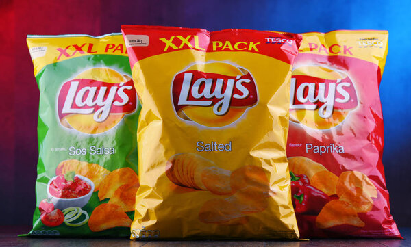 POZNAN, POLAND - DEC 20, 2018: Packets of Lay's potato chips, popular American brand founded in 1932 and owned by PepsiCo since 1965.