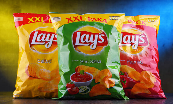 POZNAN, POLAND - DEC 20, 2018: Packets of Lay's potato chips, popular American brand founded in 1932 and owned by PepsiCo since 1965.