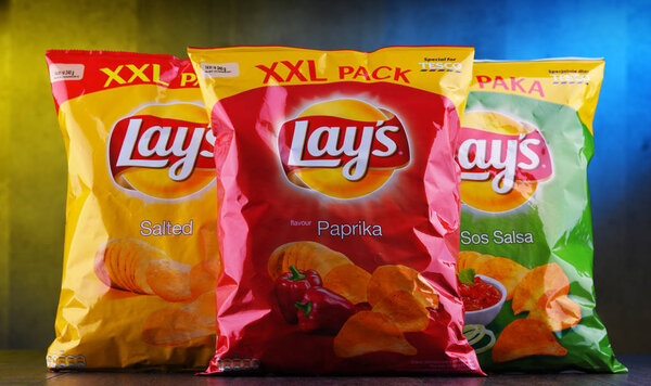 POZNAN, POLAND - DEC 20, 2018: Packets of Lay's potato chips, popular American brand founded in 1932 and owned by PepsiCo since 1965.