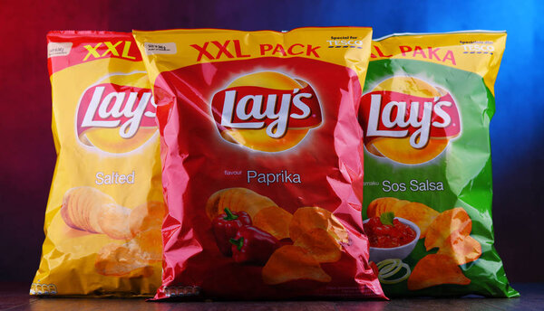 POZNAN, POLAND - DEC 20, 2018: Packets of Lay's potato chips, popular American brand founded in 1932 and owned by PepsiCo since 1965.