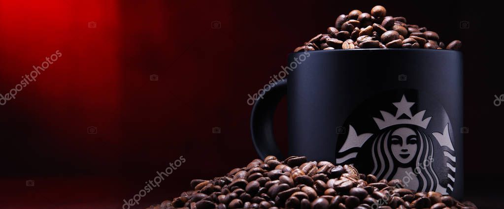 POZNAN, POL - DEC 30, 2018: Cup of Starbucks, the name of coffee company and coffeehouse chain, founded in Seattle, Wa. USA, in 1971; now the largest business of this kind in the world.
