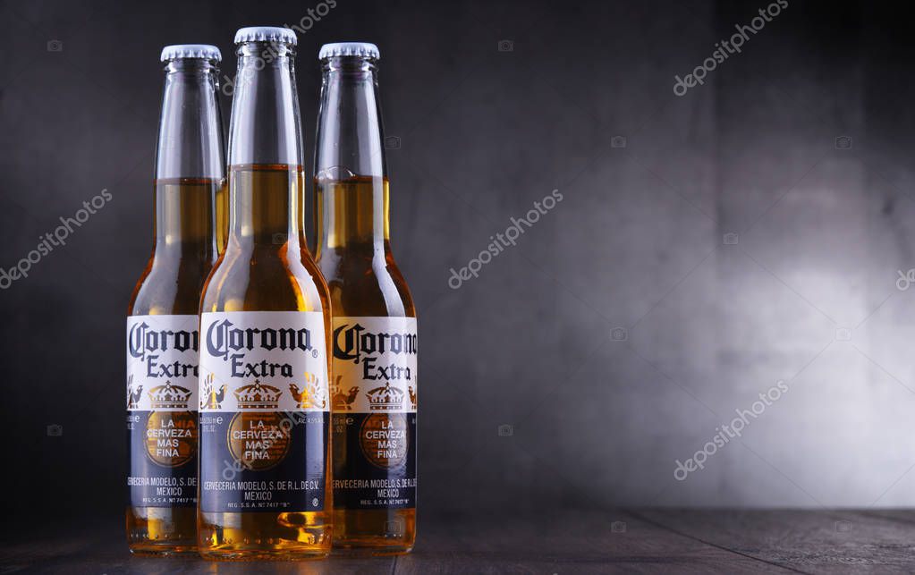 POZNAN, POL - JAN 24, 2019: Bottles of Corona Extra, one of the top-selling beers worldwide, a pale lager produced by Cerveceria Modelo in Mexico