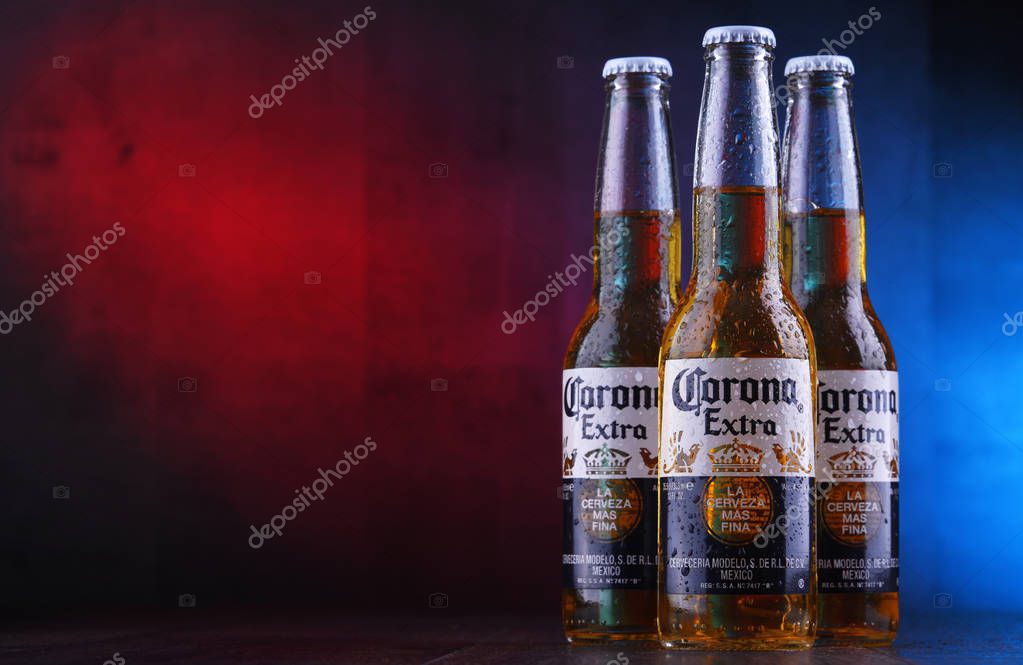 POZNAN, POL - JAN 24, 2019: Bottles of Corona Extra, one of the top-selling beers worldwide, a pale lager produced by Cerveceria Modelo in Mexico