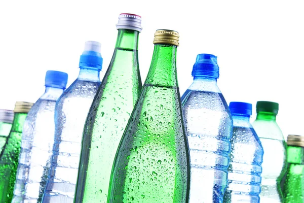 Different sorts of bottles containing mineral water — Stock Photo, Image