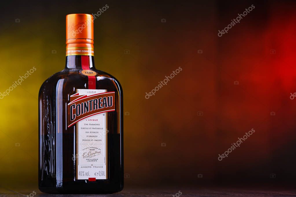 POZNAN, POL - MAR 22, 2019: Bottle of Cointreau, a brand of French triple sec (an orange-flavoured liqueur); great component of several well-known cocktails, also drunk as an aperitif and digestif