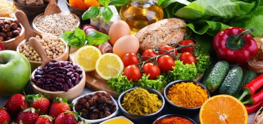 Assorted organic food products on the table clipart