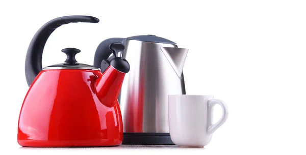 Stovetop kettle with whistle and electric cordless kettle — Stock Photo, Image