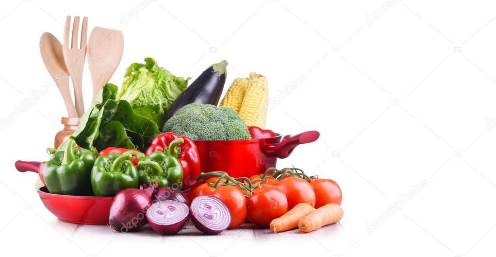 Fresh vegetables and cooking pot on kitchen table