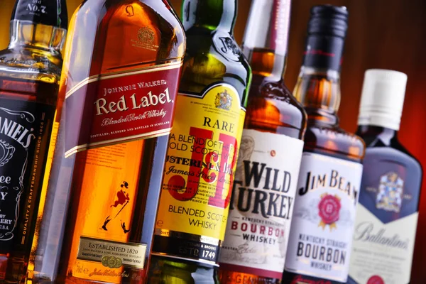 Bottles of several global whiskey brands — Stock Photo, Image