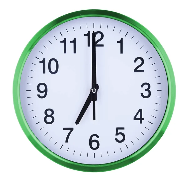 Настінний годинник ізольовано на білому тлі. Сім годин — стокове фото