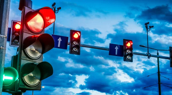 Traffic lights over urban intersection — Stock Photo, Image