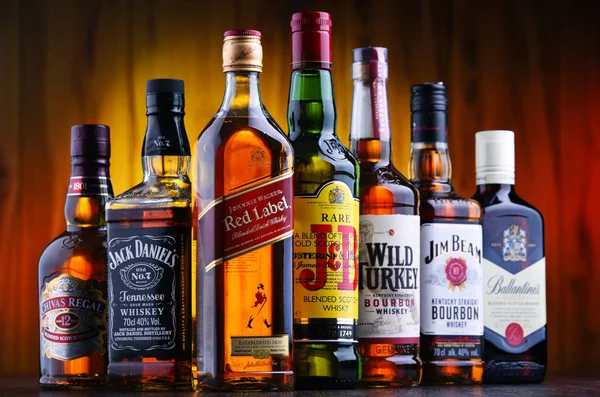 Bottles of several global whiskey brands — Stock Photo, Image