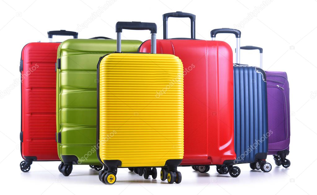 Travel suitcases isolated on white background