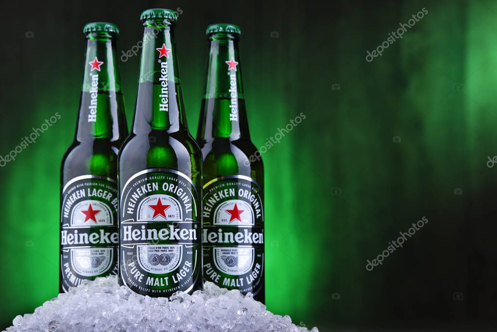 POZNAN, POL - AUG 22, 2019: Bottles of Heineken Lager Beer, the flagship product of Heineken International which owns over 125 breweries in more than 70 countries