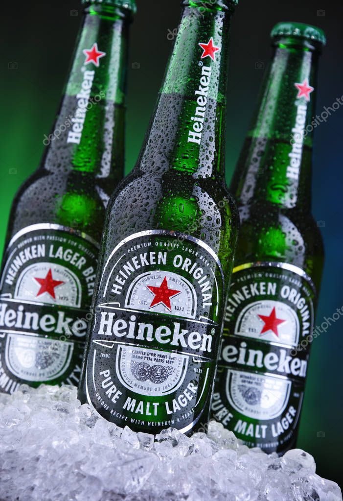 POZNAN, POL - AUG 22, 2019: Bottles of Heineken Lager Beer, the flagship product of Heineken International which owns over 125 breweries in more than 70 countries