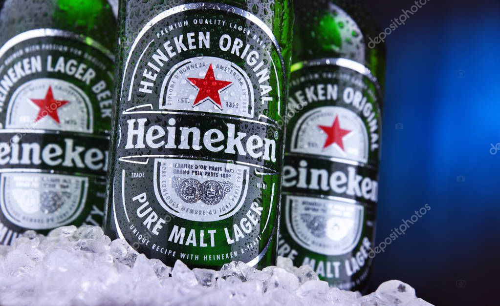 POZNAN, POL - AUG 22, 2019: Bottles of Heineken Lager Beer, the flagship product of Heineken International which owns over 125 breweries in more than 70 countries