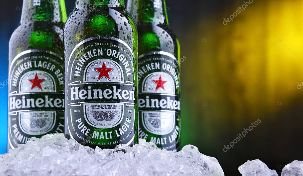POZNAN, POL - AUG 22, 2019: Bottles of Heineken Lager Beer, the flagship product of Heineken International which owns over 125 breweries in more than 70 countries