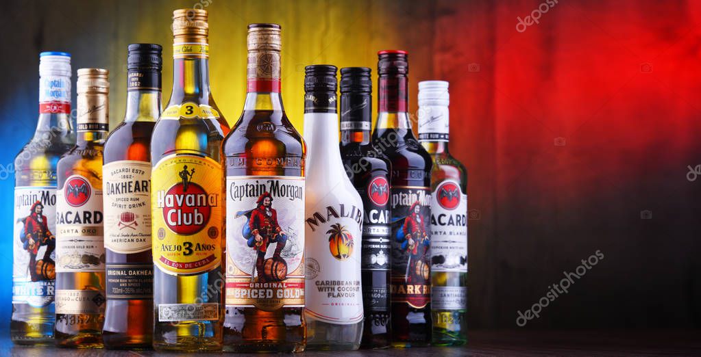 POZNAN, POL - AUG 22, 2019: Bottles of best selling global rum brands including Bacardi, Havana Club and Captain Morgan