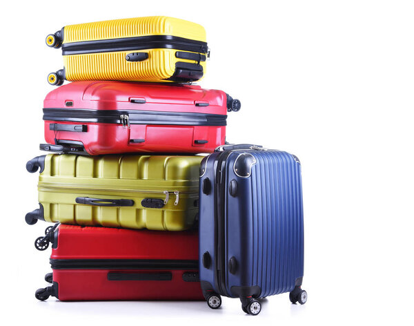 Travel suitcases isolated on white background