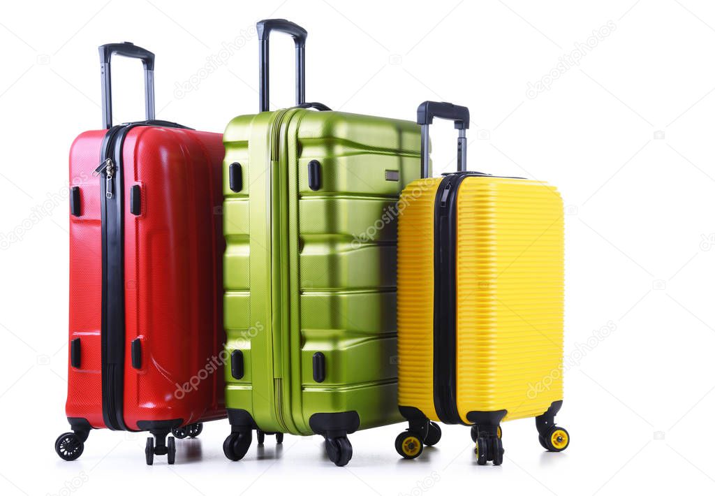 Travel suitcases isolated on white background