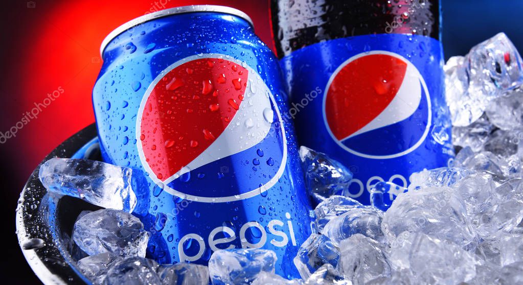 POZNAN, POL - SEP 5, 2019: Bottle and can of Pepsi, a carbonated soft drink produced and manufactured by PepsiCo. The beverage was created and developed in 1893 under the name Brad's Drink