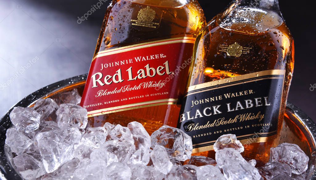 POZNAN, POL - SEP 5, 2019: Bottles of Johnnie Walker, the most widely distributed brand of blended Scotch whisky in the world with sales of over 130 million bottles a year.