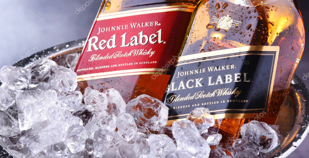 POZNAN, POL - SEP 5, 2019: Bottles of Johnnie Walker, the most widely distributed brand of blended Scotch whisky in the world with sales of over 130 million bottles a year.
