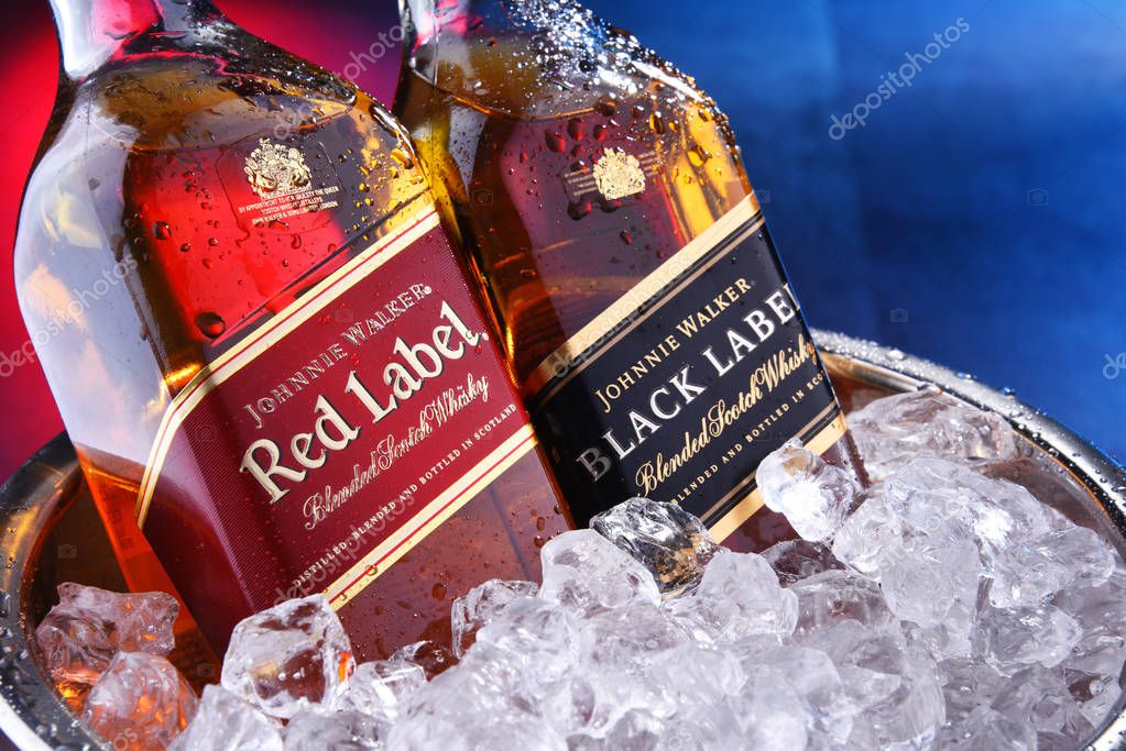 POZNAN, POL - SEP 5, 2019: Bottles of Johnnie Walker, the most widely distributed brand of blended Scotch whisky in the world with sales of over 130 million bottles a year.