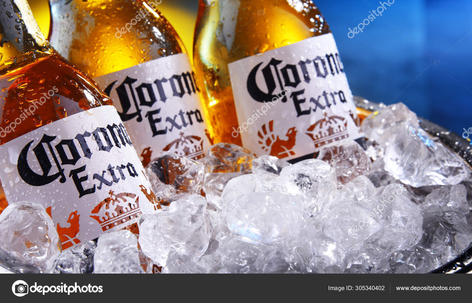 Bottles of Corona Extra beer in the with ice – Editorial Photo © monticello #305340402