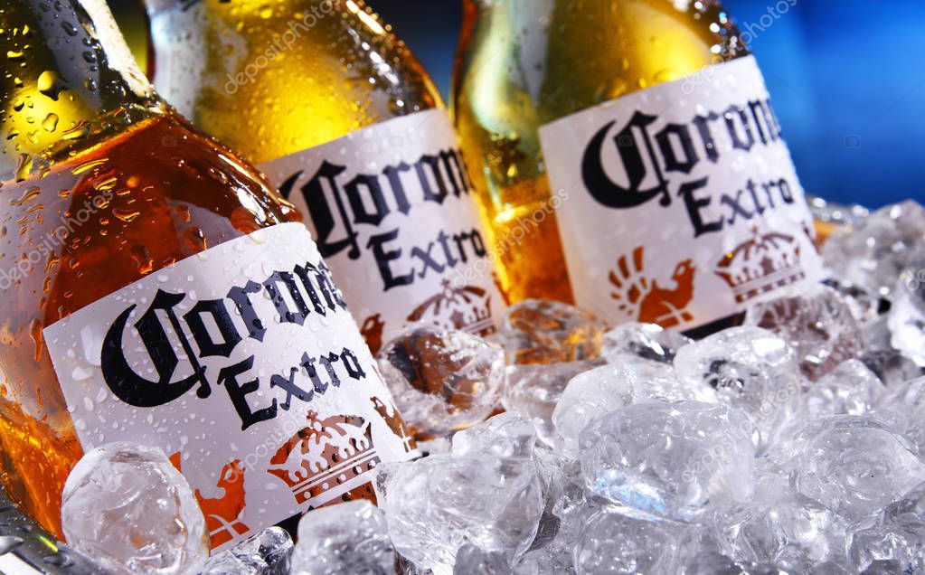POZNAN, POL - SEP 5, 2019: Bottles of Corona Extra, one of the top-selling beers worldwide, a pale lager produced by Cerveceria Modelo in Mexico