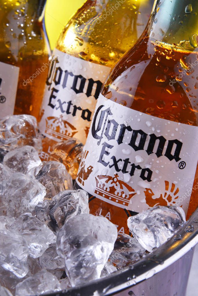 POZNAN, POL - SEP 5, 2019: Bottles of Corona Extra, one of the top-selling beers worldwide, a pale lager produced by Cerveceria Modelo in Mexico