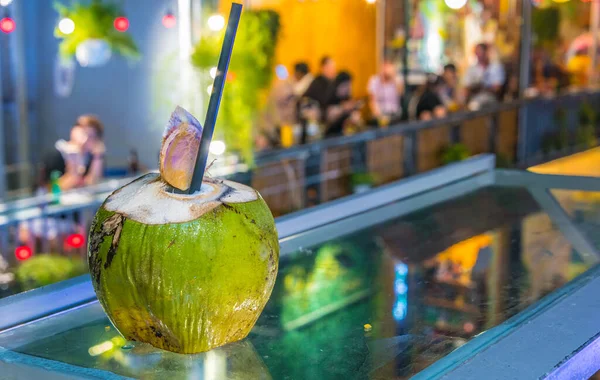 Fresh coconut drink served in the bar in Hanoi — Stock Photo, Image