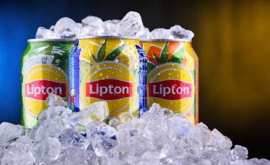 Three cans of Lipton Ice Tea soft drink. clipart