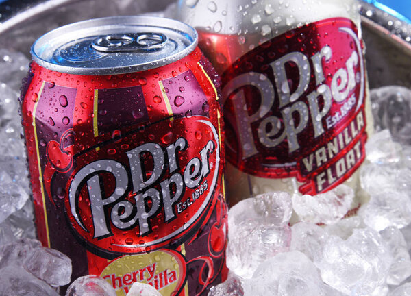 Two cans of carbonated soft drink Dr Pepper
