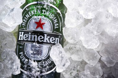 POZNAN, POL - MAY 22, 2020: Bottle of Heineken Lager Beer, the flagship product of Heineken International which owns over 125 breweries in more than 70 countries clipart