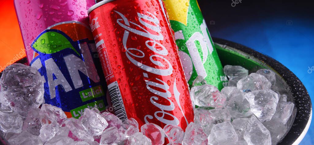 POZNAN, POL - MAY 15, 2020: Cans of Coke, Fanta and Sprite, the flagship brands of Coca Cola Company, American multinational beverage corporation,  headquartered in Atlanta, Georgia, USA