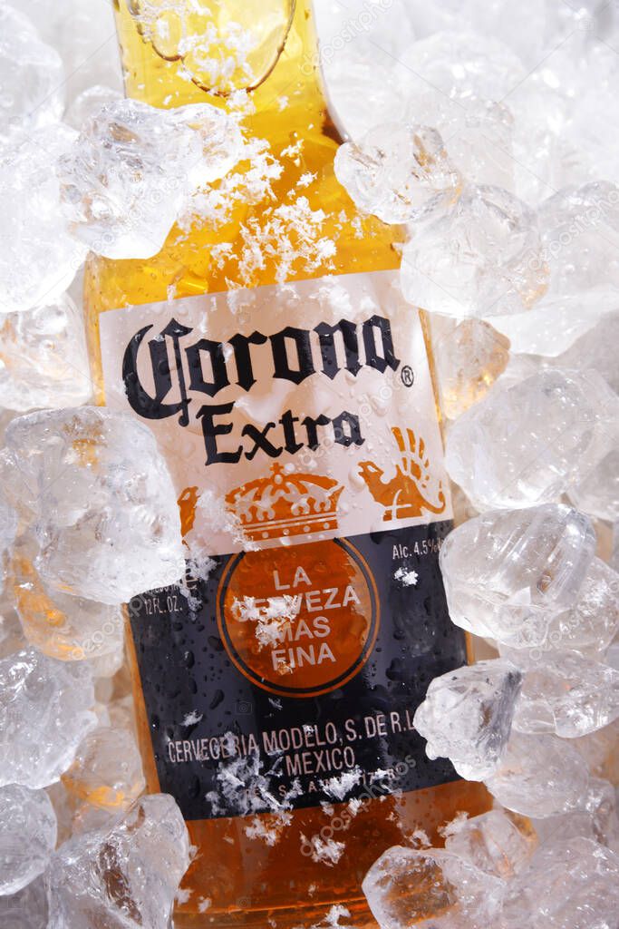 POZNAN, POL - MAY 22, 2020: Bottle of Corona Extra, one of the top-selling beers worldwide, a pale lager produced by Cerveceria Modelo in Mexico