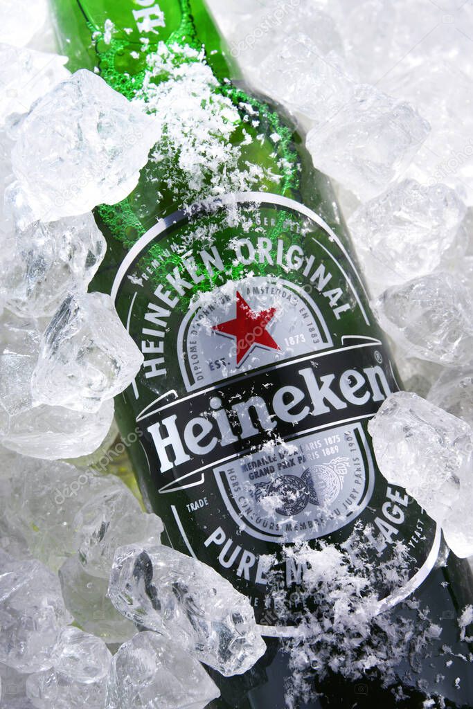 POZNAN, POL - MAY 22, 2020: Bottle of Heineken Lager Beer, the flagship product of Heineken International which owns over 125 breweries in more than 70 countries