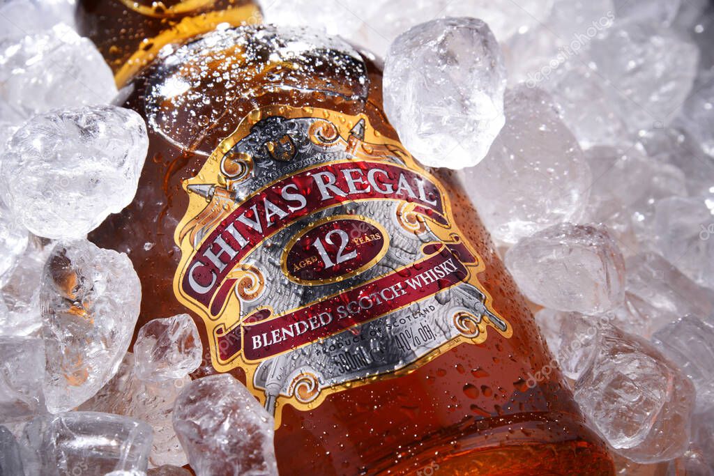POZNAN, POL - MAY 28, 2020: Bottle of Chivas Regal 12, a blended Scotch whisky made from whiskies matured for at least 12 years, produced by Chivas Brothers in Keith, Scotland