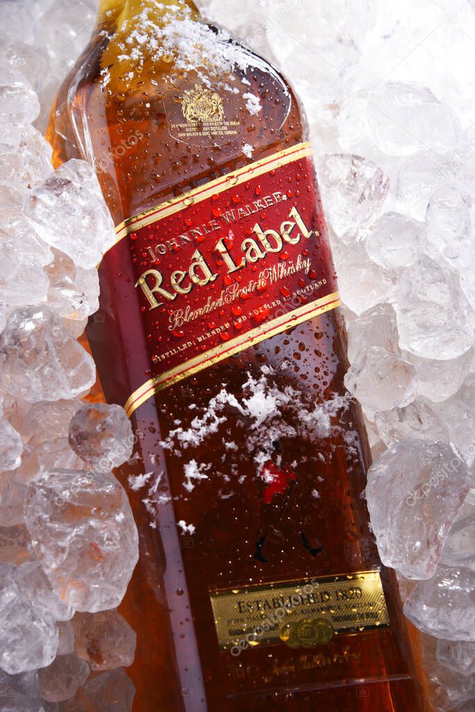 POZNAN, POL - MAY 28, 2020: Bottles of Johnnie Walker, the most widely distributed brand of blended Scotch whisky in the world with sales of over 130 million bottles a year.