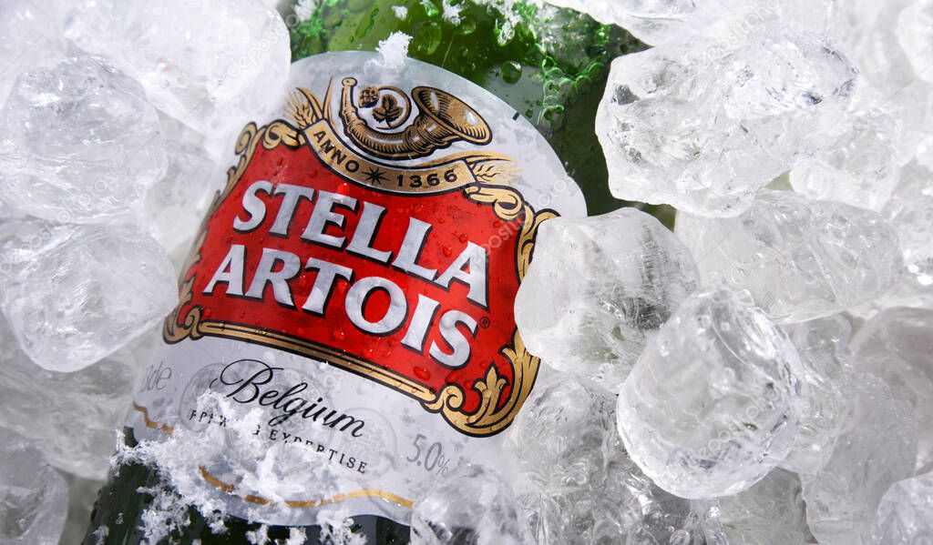 POZNAN, POL - MAY 28, 2020: Bottle of Stella Artois, prominent brand of Anheuser-Busch InBev. It is a pilsner brewed in Leuven, Belgium, since 1926