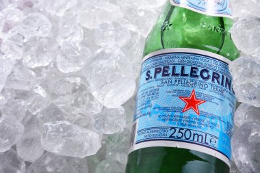 POZNAN, POL - JUN 18, 2020: Bottle of San Pellegrino, an Italian brand of mineral water made in the Province of Bergamo, Italy. Owned by Nestle since 1997. clipart