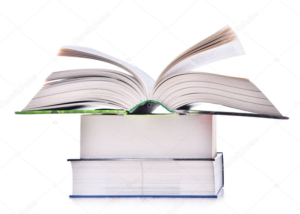 Composition with stack of books isolated on white.