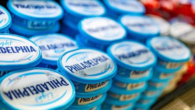 MUSCAT, OMAN - MAR 14, 2024: Philadelphia Cream Cheese put out for sale in a commercial refrigerator in a supermarket